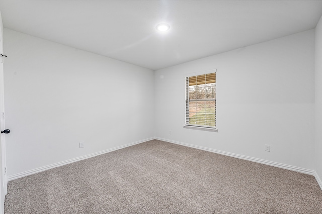 view of carpeted spare room