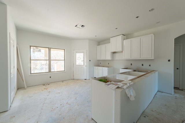 kitchen with white cabinets