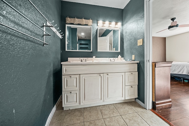 bathroom with vanity, tile patterned floors, and ceiling fan