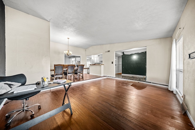 office with a textured ceiling, a chandelier, and wood-type flooring