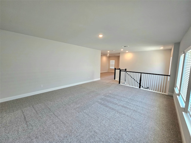 empty room with carpet flooring