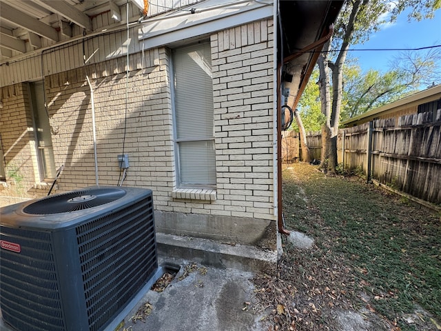 view of property exterior featuring central AC unit