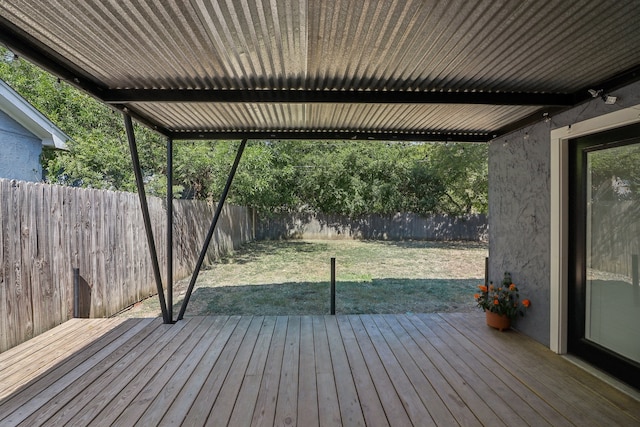 wooden deck with a yard