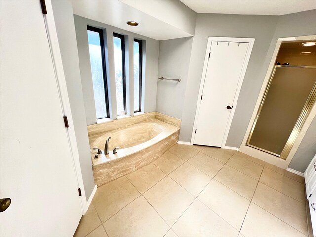 kitchen with lofted ceiling, stainless steel appliances, backsplash, crown molding, and light wood-type flooring