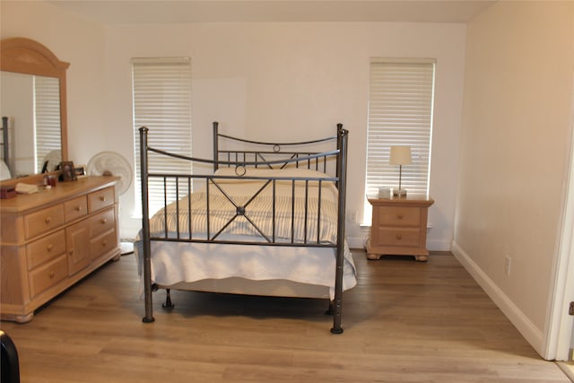 bedroom featuring hardwood / wood-style floors