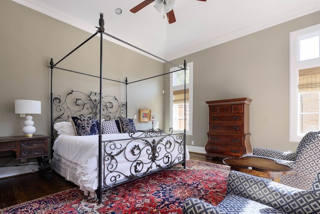 bedroom featuring ceiling fan, ornamental molding, and hardwood / wood-style floors