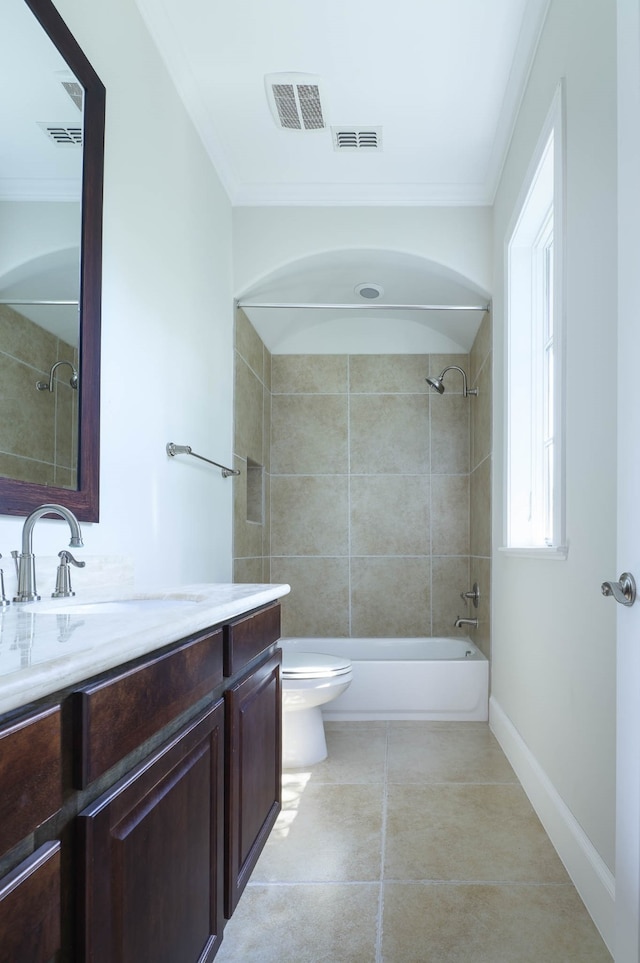 full bathroom with toilet, crown molding, tiled shower / bath combo, and vanity