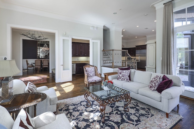 living room featuring ornamental molding and dark wood-type flooring