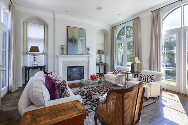 living room with crown molding and dark hardwood / wood-style floors