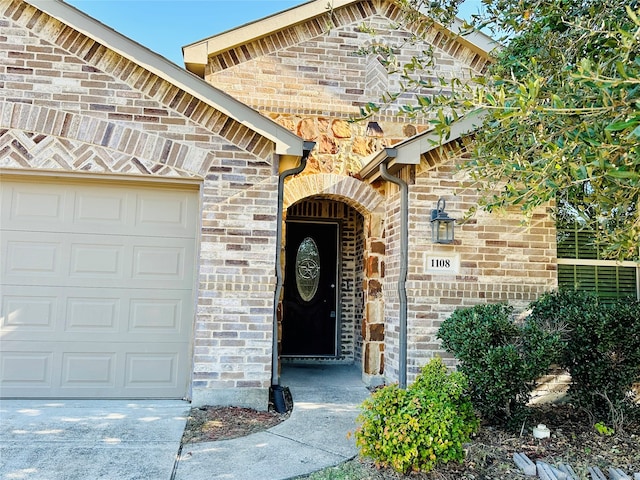 entrance to property with a garage