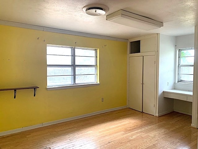 unfurnished bedroom featuring light hardwood / wood-style flooring