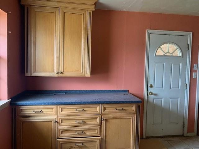 807 N Morris Ave, Rotan, TX 79546 - interior space featuring dark countertops and light tile patterned floors