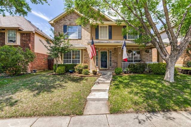 view of front of home featuring a front lawn