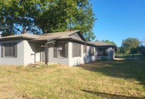 view of property exterior featuring a yard