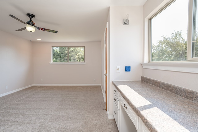 bathroom featuring ceiling fan