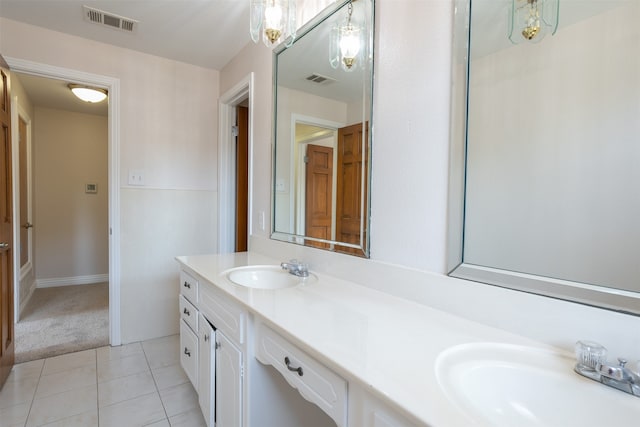 bathroom with vanity and tile patterned floors