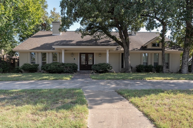 view of front of home with a front yard