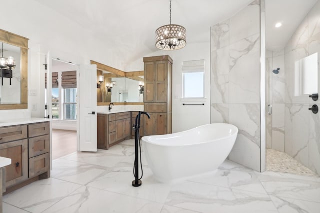 bathroom with separate shower and tub, tile walls, vaulted ceiling, and a notable chandelier