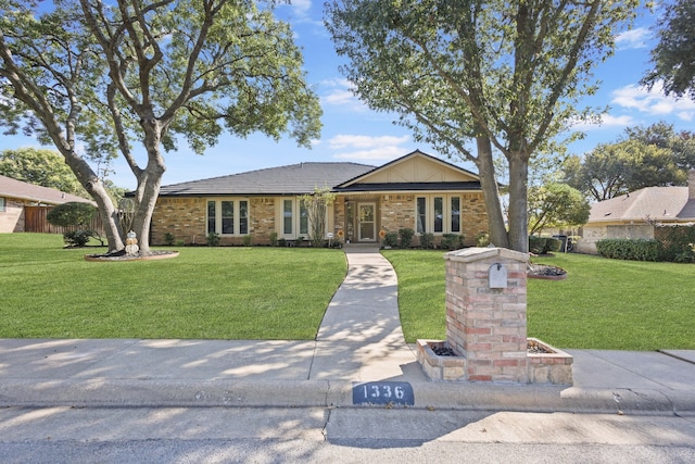 ranch-style house with a front yard