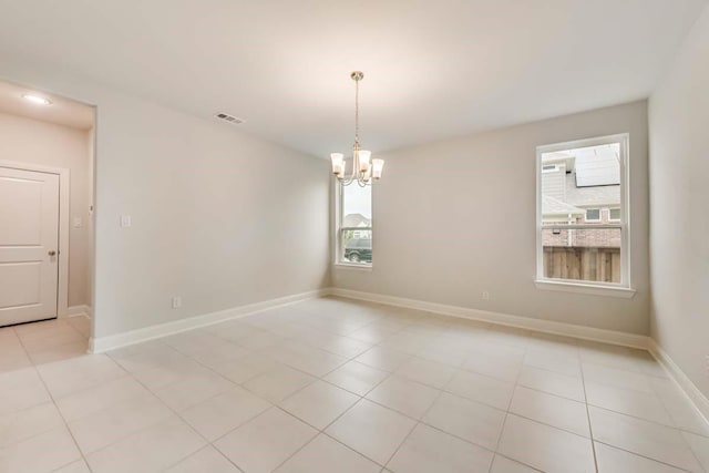 2802 Chandler Ct, Mansfield, TX 76063 - unfurnished room with a chandelier, visible vents, baseboards, and light tile patterned floors