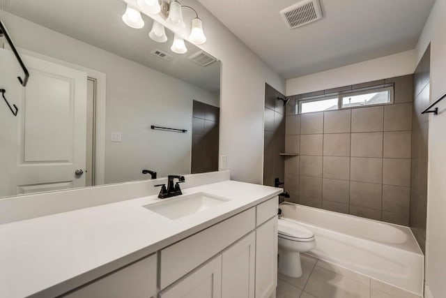 2802 Chandler Ct, Mansfield, TX 76063 - bathroom featuring vanity, bathtub / shower combination, toilet, tile patterned flooring, and visible vents