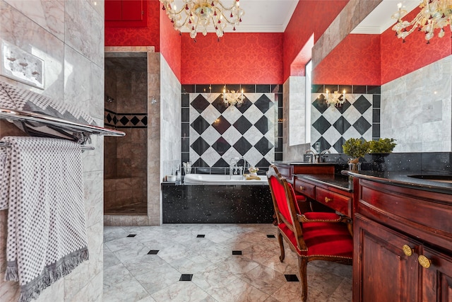 bathroom featuring separate shower and tub, tile walls, vanity, crown molding, and a chandelier