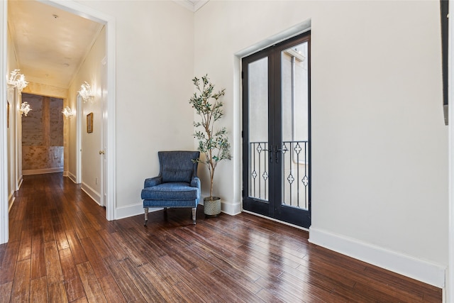 entrance foyer featuring french doors, dark hardwood / wood-style floors, and crown molding