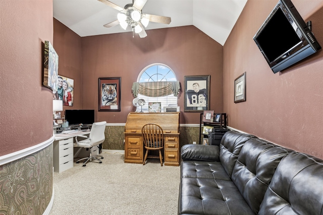 carpeted office featuring ceiling fan and vaulted ceiling