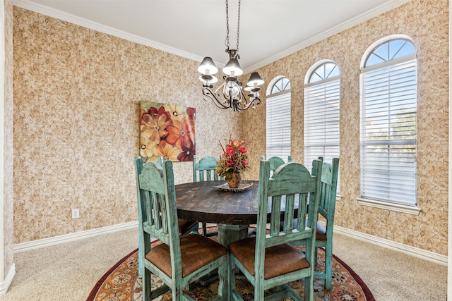 carpeted dining area featuring ornamental molding and a notable chandelier