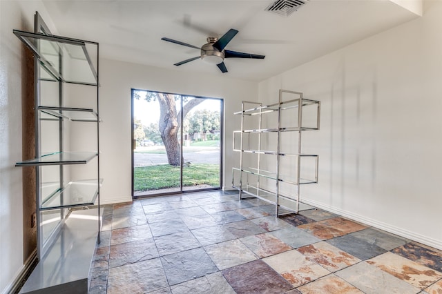 empty room with ceiling fan