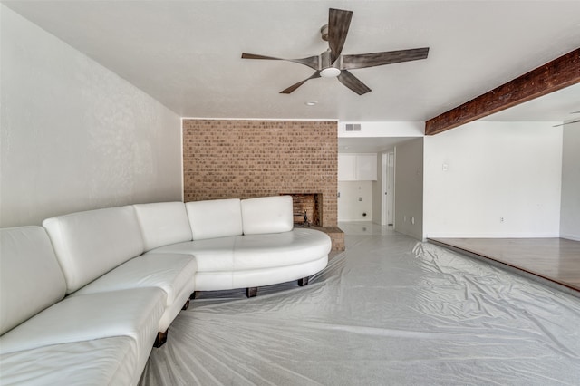 unfurnished living room with ceiling fan