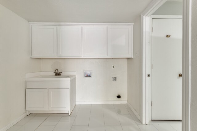 laundry room with light tile patterned floors, sink, washer hookup, and electric dryer hookup