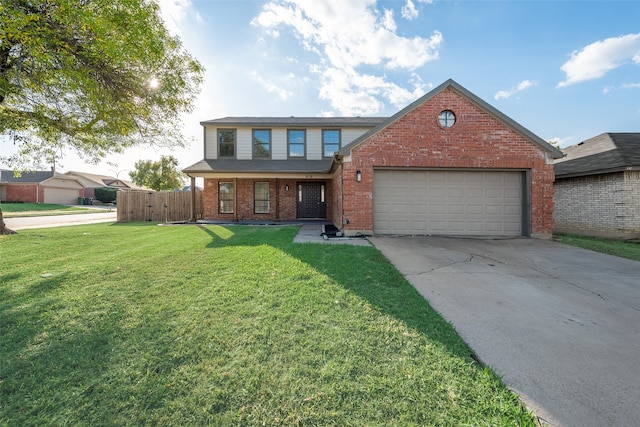 view of front of house featuring a front yard and a garage