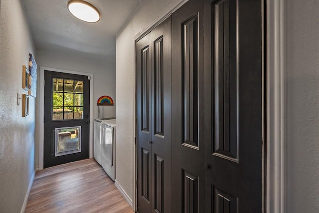 504 E Monterey St, Denison, TX 75021 - interior space with washing machine and dryer, baseboards, and a textured wall