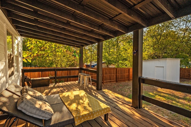 deck featuring a shed