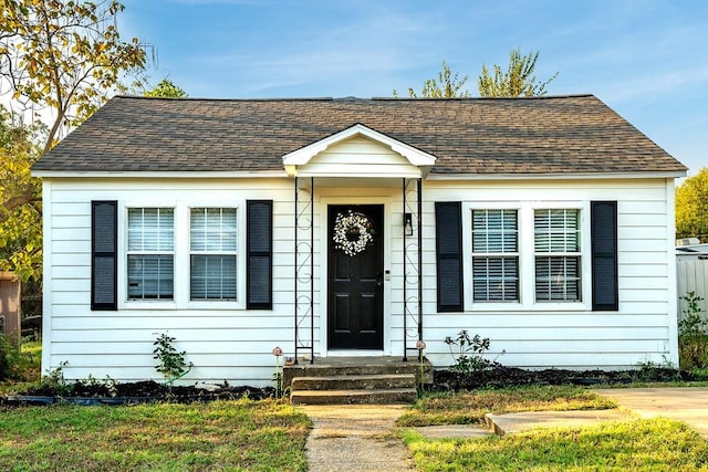 504 E Monterey St, Denison, TX 75021 - view of front of property with a shingled roof