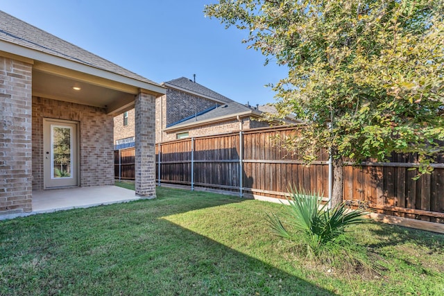 view of yard with a patio area