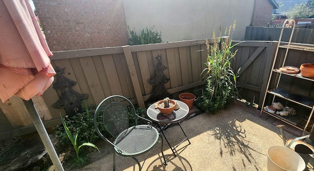 view of patio with fence