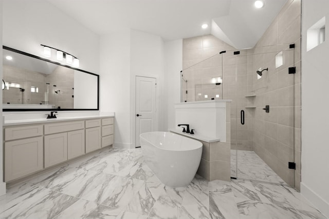 bathroom featuring lofted ceiling, vanity, and independent shower and bath