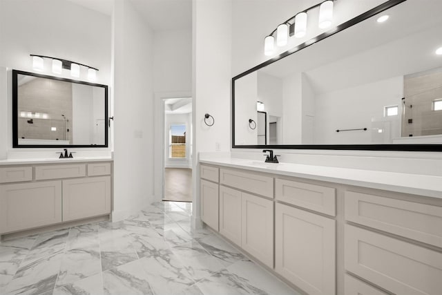 bathroom featuring vanity and a shower