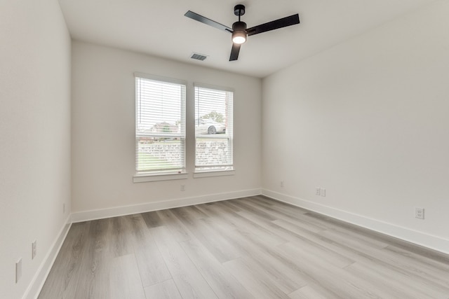 unfurnished room featuring ceiling fan and light hardwood / wood-style flooring