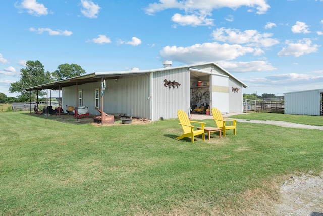 view of outdoor structure featuring a yard