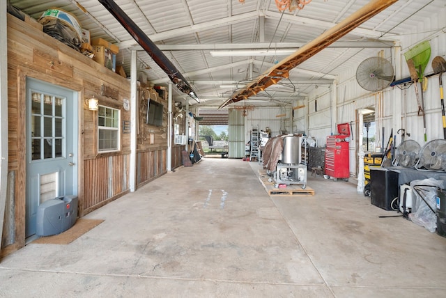 garage with wood walls