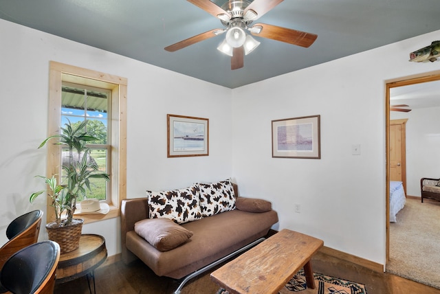 living room featuring ceiling fan