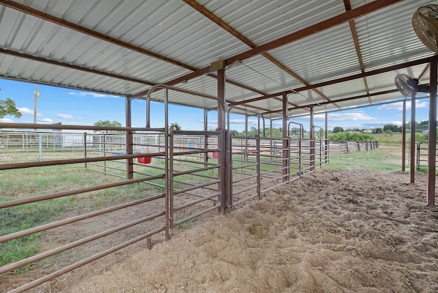 view of stable featuring a rural view