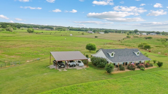 birds eye view of property featuring a rural view