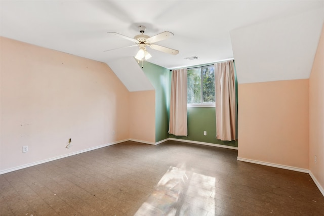 bonus room featuring ceiling fan and vaulted ceiling