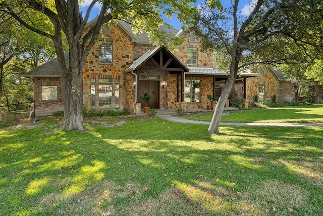 view of front of home with a front lawn