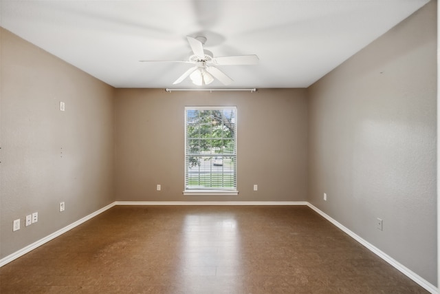 spare room featuring ceiling fan