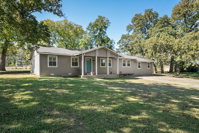 single story home with a front yard